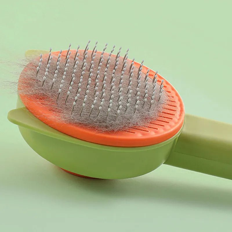 Peigne en Acier Inoxydable pour Chat – Brosse de Massage et Éliminateur de Poils à Un Bouton - Le Palais Du Chat